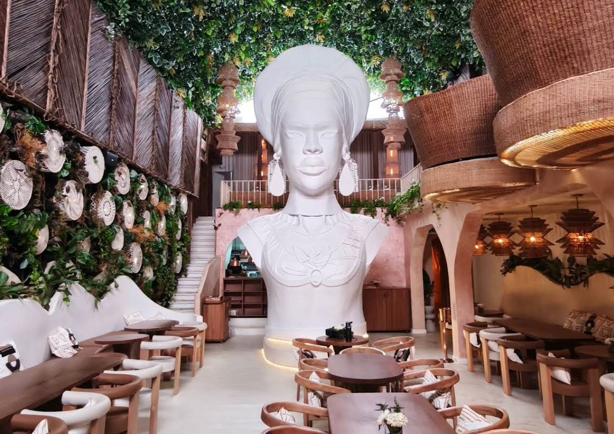 High-end Afro-Caribbean dining in electric ambience.